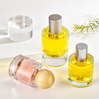kopen Van de de Flessen30ml 50ml Bajonet van het parfumglas van het de Cilinder de Transparante Parfum Fles van de de Schoonheidsmiddelennevel van Subpackage met Houten Dekking online manufacture